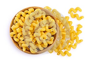 raw pasta cavatappi in wooden bowl isolated on white background with clipping path and full depth of field. Top view