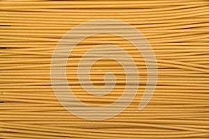 Raw Pasta closeup background. Italian spaghetti. Textured background culinary theme