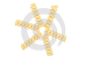 Raw pasta fusilli bucati isolated on white