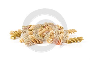 Raw pasta fusilli isolated on white