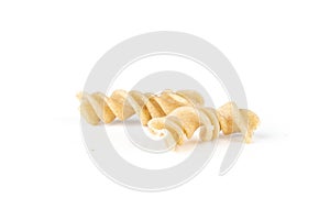 Raw pasta fusilli isolated on white