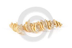 Raw pasta fusilli isolated on white