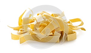 raw pasta noodles on white isolated background