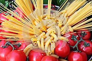 Raw pasta and tomatoes