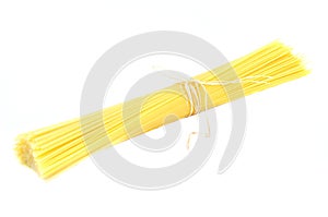 Raw pasta on white background