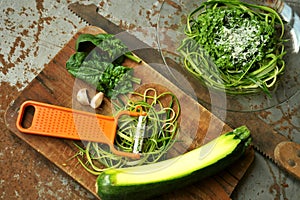 Raw pasta with zucchini and spinach pesto with garlic