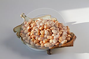 Raw peanut kernel on a white background