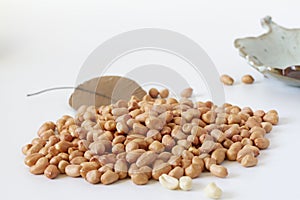 Raw peanut kernel on a white background