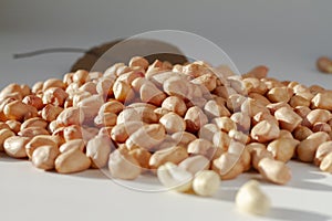 Raw peanut kernel on a white background