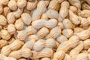 Raw Peanuts as background.