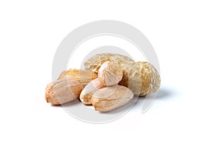 Raw peanuts isolated on white. Heap of groundnuts in a nutshell