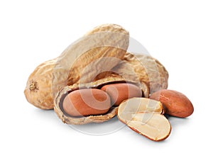 Raw peanuts on white background