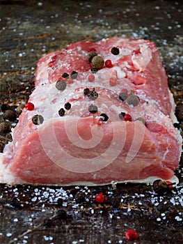 Raw piece of pork loin, breast. For steak, roasting, stewing, roasting.