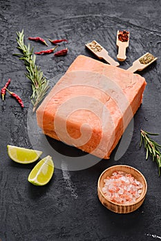 Raw pieces of salmon pressed in briquette