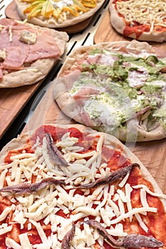 Raw pizzas