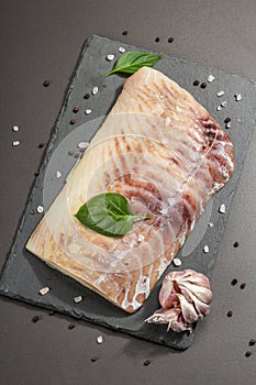 Raw pollock Pollachius virens fillet. Fresh fish for healthy food lifestyle