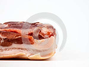 Raw pork belly isolated on white copyspace closeup