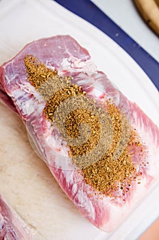 Raw pork belly with spices mixture
