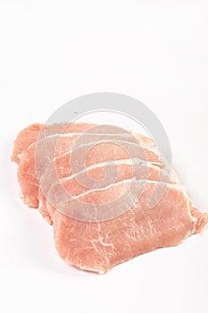 Raw Pork Chop Isolated Above White Background