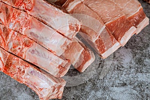 Raw pork chop steak on cutting board