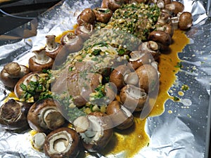 Raw pork with juicy seasoning and baby cheshunt mushrooms