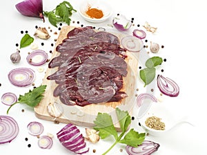 Raw pork liver slice with flavoring spices japanese and asian food