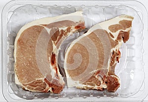 Raw pork loin chops