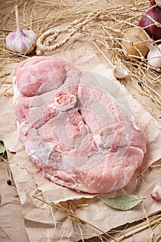 Raw pork meat - ham or leg. Fresh organic meat and ingredients