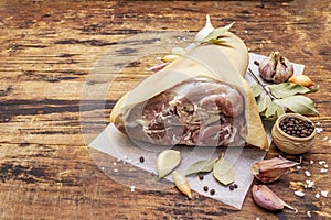 Raw pork meat - hock, knuckle or leg. Traditional ingredient for eisbein. Fresh meat, dry spices and vegetables