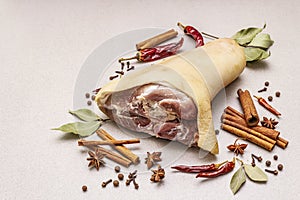 Raw pork meat - hock, knuckle or leg. Traditional ingredient for eisbein. Fresh meat, dry spices and vegetables