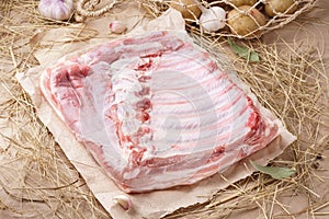 Raw pork meat - spare ribs or belly. Fresh meat and ingredients