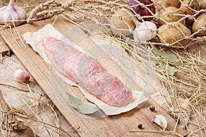 Raw pork meat - tenderloin or fillet. Fresh meat and ingredients