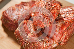 Raw pork meat wallowed with herbs