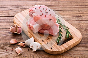Raw pork meat on wooden desk