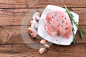 Raw pork meat on wooden desk