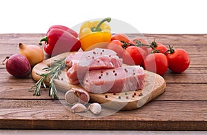 Raw pork meat on wooden desk