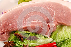 Raw pork meat isolated on white background with clipping path photo