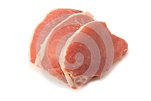 Raw pork pieces isolated on a white background