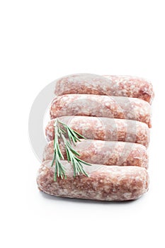 Raw pork sausages isolated on white background