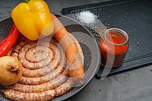 Raw pork saussage with ingredients