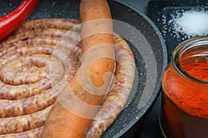 Raw pork saussage with ingredients