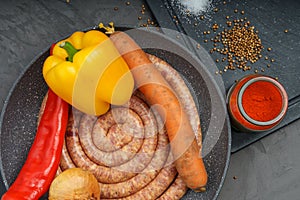 Raw pork saussage with ingredients