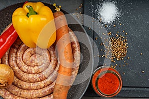 Raw pork saussage with ingredients