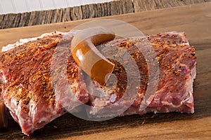 Raw pork spare-ribs with seasoned rub