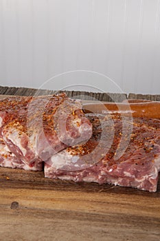 Raw pork spare-ribs with seasoned rub photo