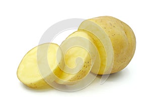 Raw potato sliced into pieces, Organic vegetable, Isolated on white background, Cut out with clipping path.