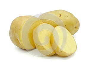 Raw potato sliced into pieces, Organic vegetable, Isolated on white background, Cut out with clipping path.