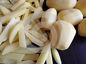 Raw Potato sliced strips prepared for French fries