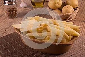 Raw Potato sliced strips prepared for French fries