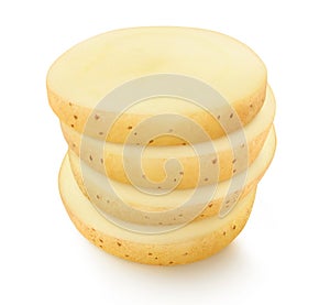 Raw potato slices on top of each other isolated on white
